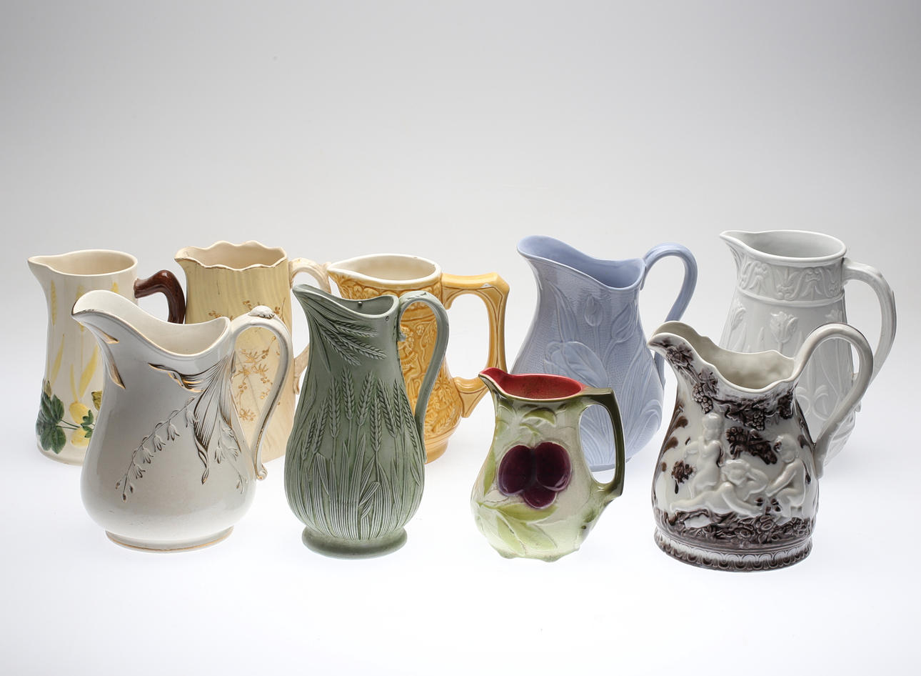 KANNOR, 9 st, porslin, bl a Rörstrand, Gustavsberg och Gefle, 1800-/1900-tal.