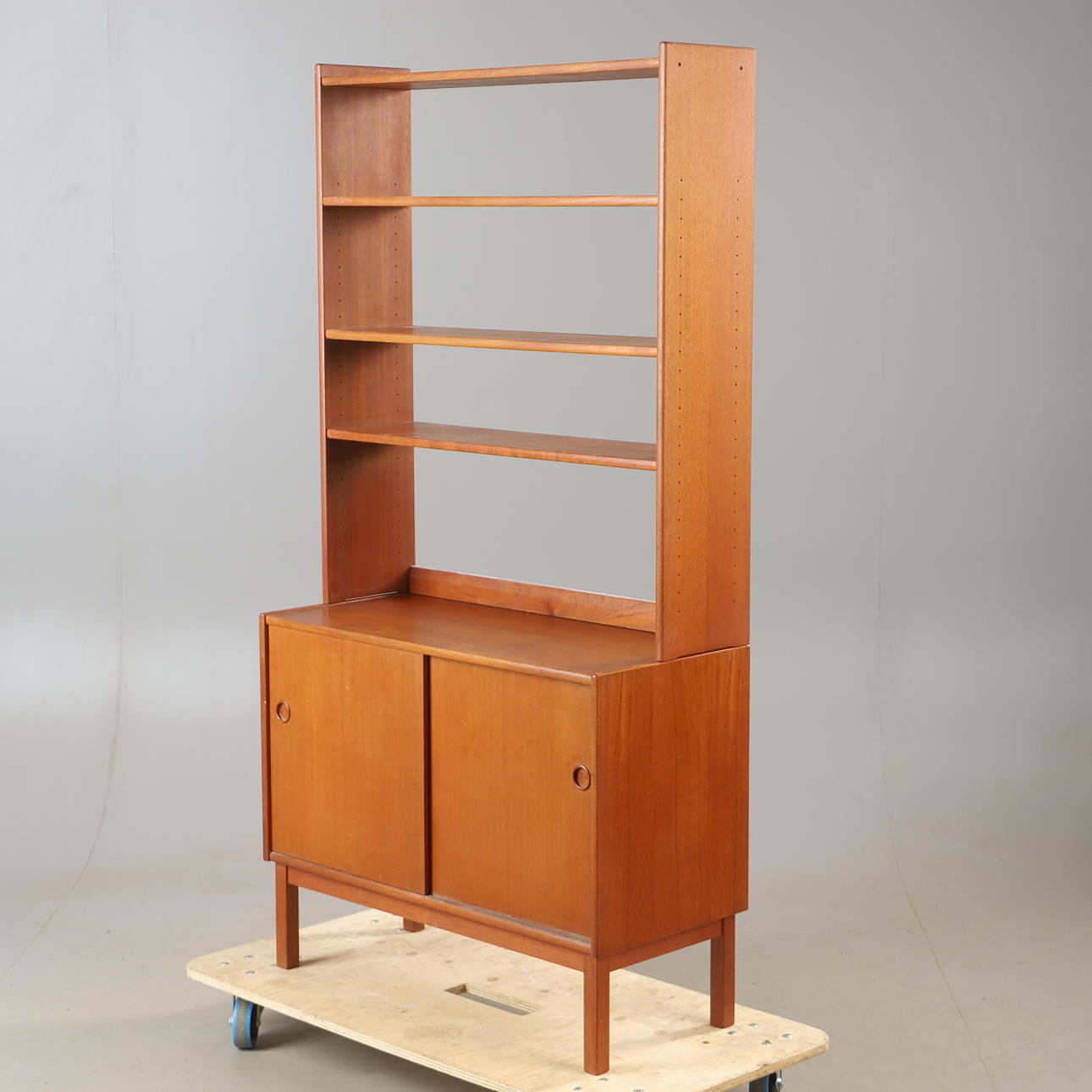 BOOKCASE, teak, mid-20th century.