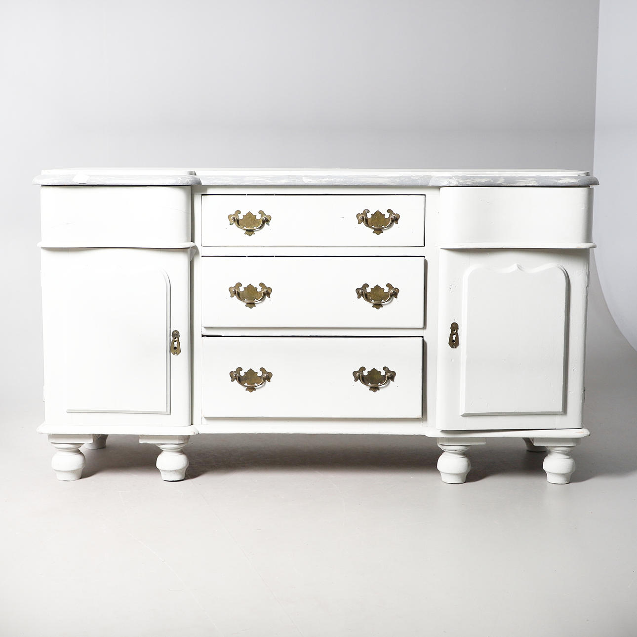 A VICTORIAN PAINTED DRESSER BASE.