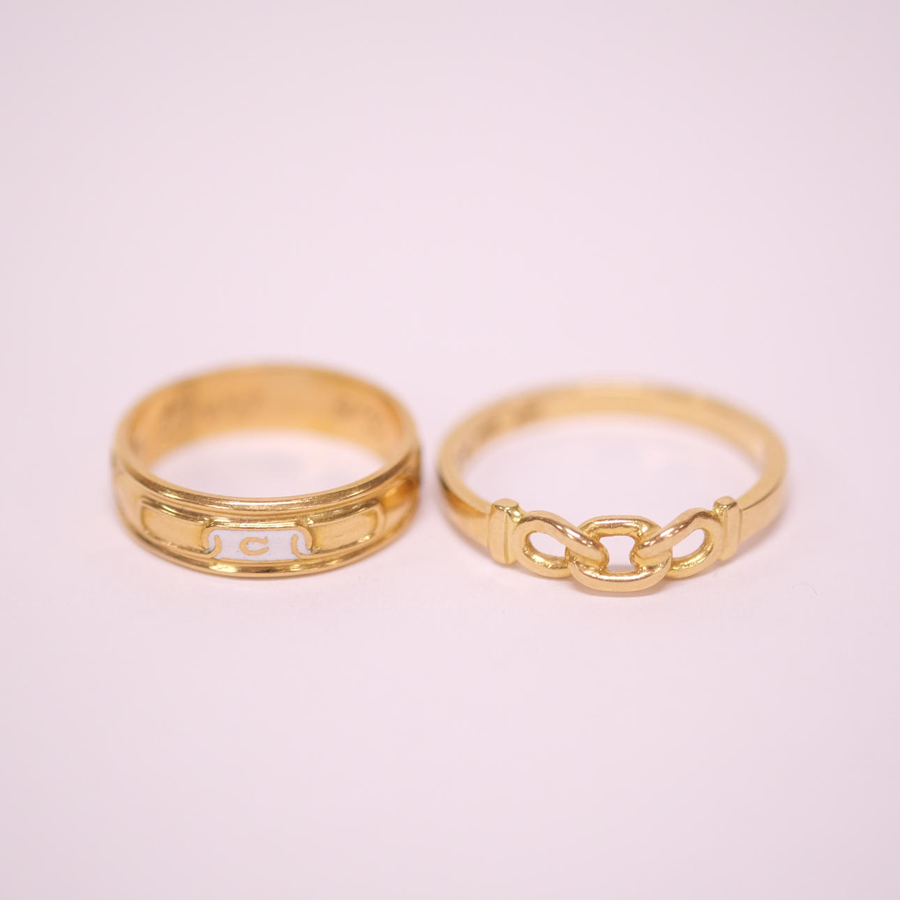 TWO ORDER RINGS 18 K GOLD.