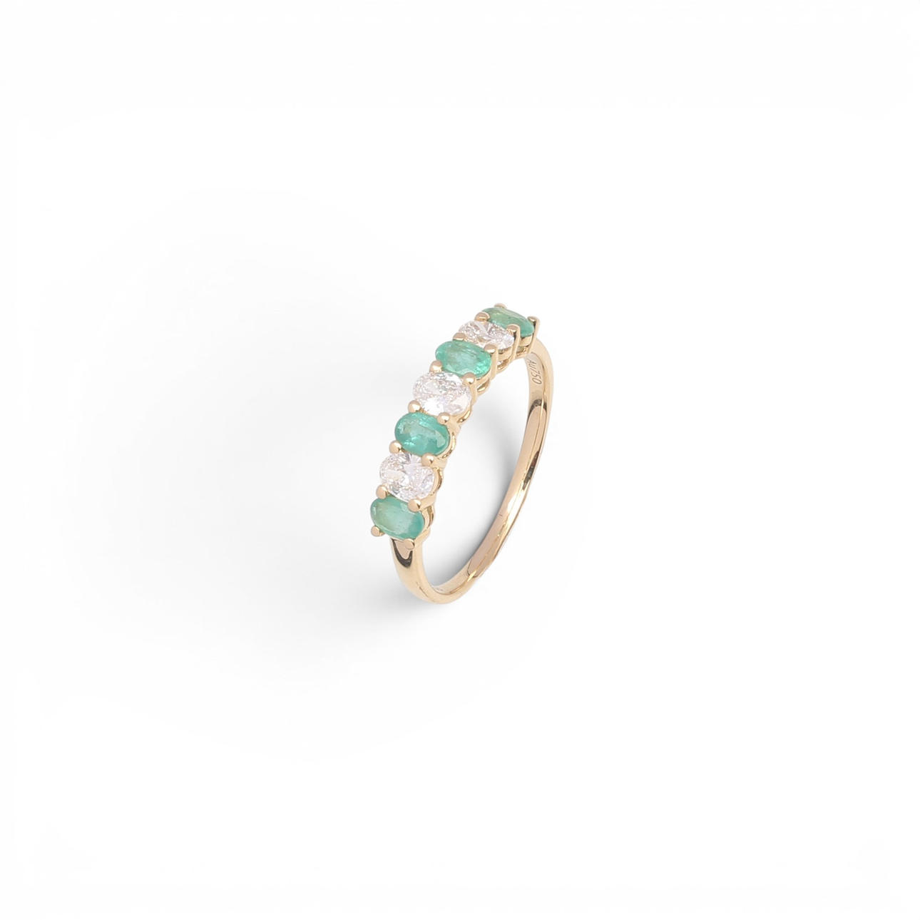 Diamonds and emeralds ring.