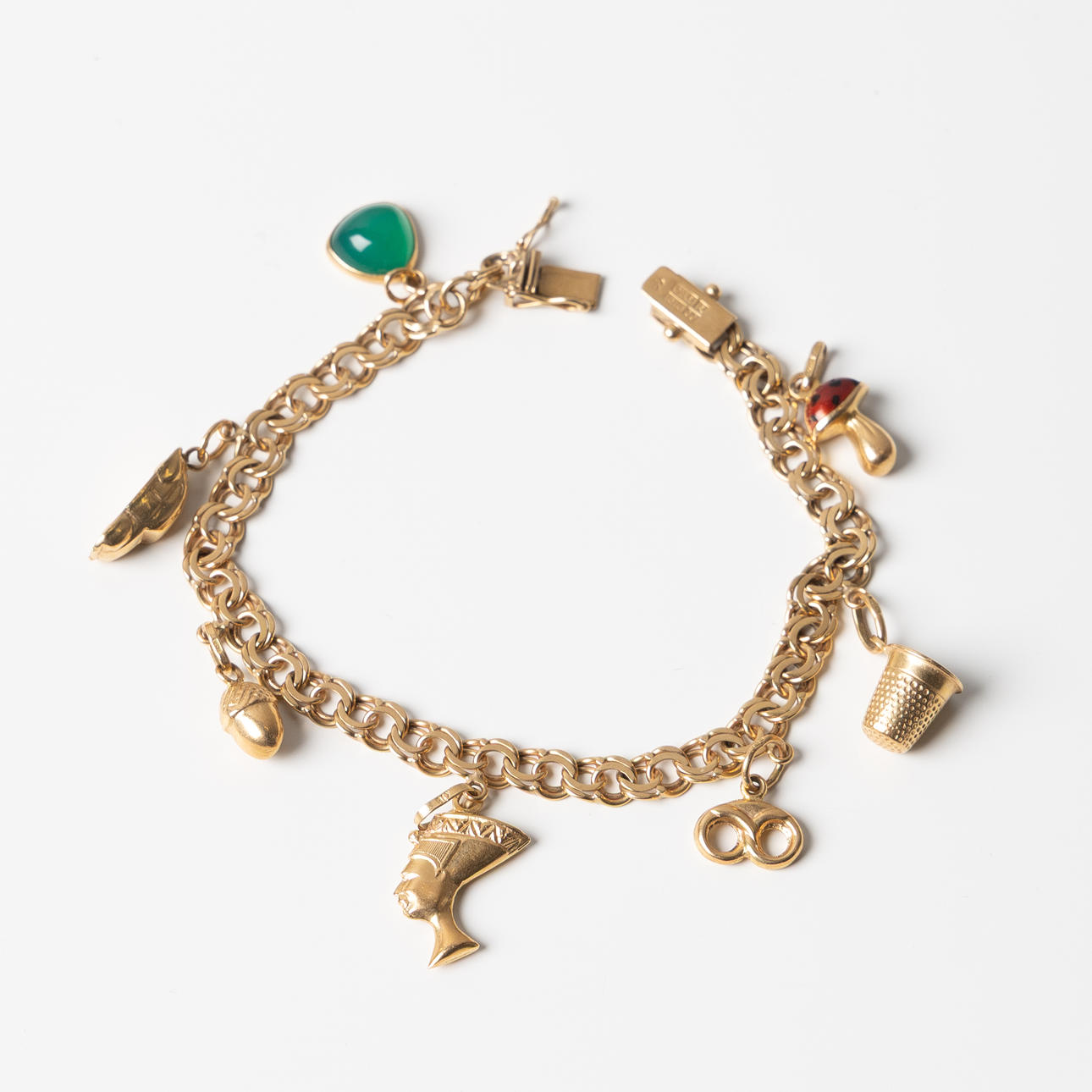 BERLOCKARMBAND, 18K guld.