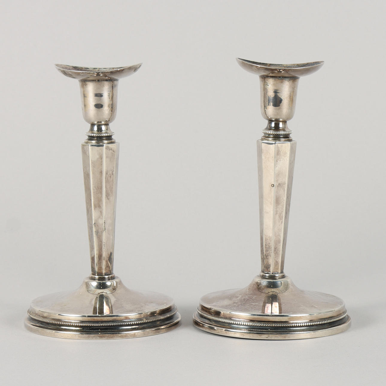 CANDLESTICKS, a pair, silver.