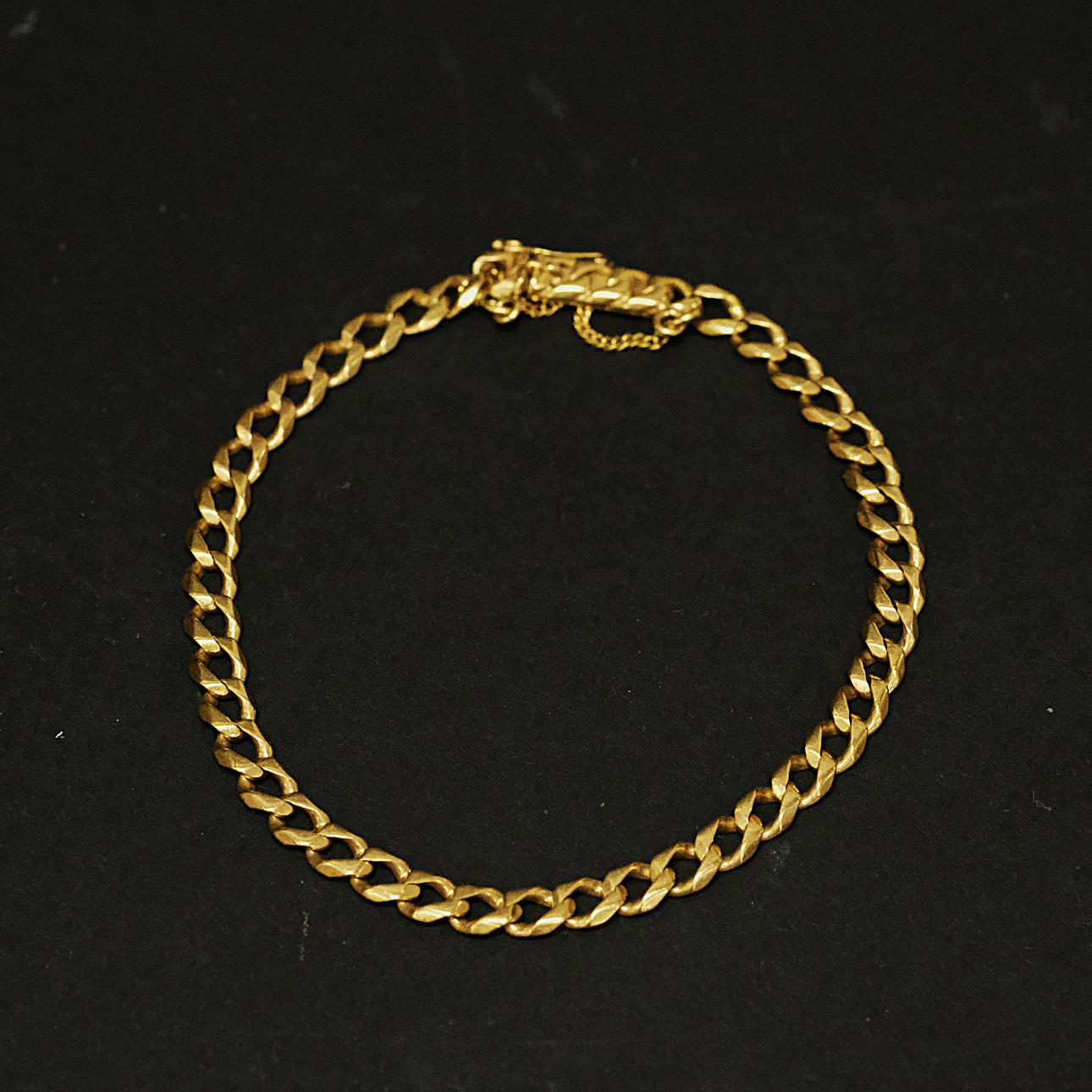 ARMBAND, "PANSAR", 18K GULD.