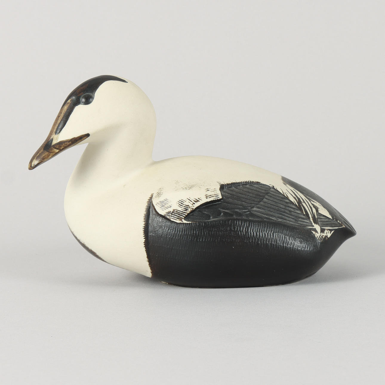 PAUL HOFF. Eider, ceramic, Gustavsberg, signed.