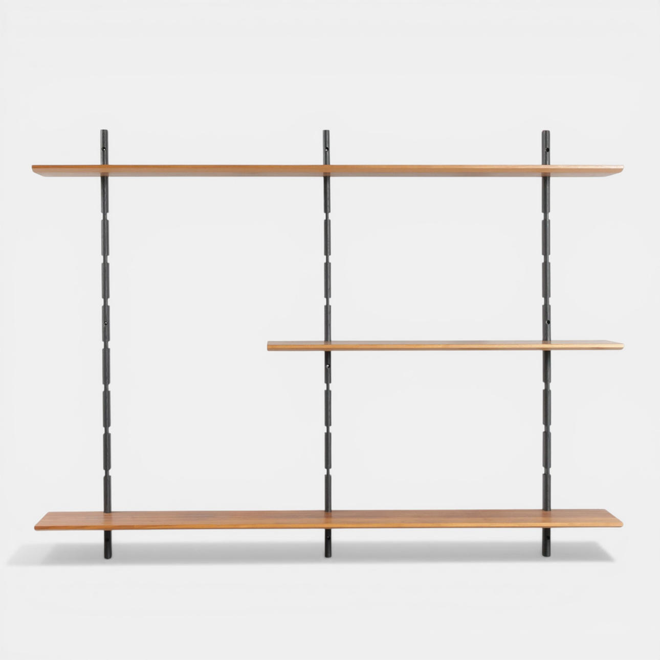 Wall-mounted shelving system with floating shelves (6).