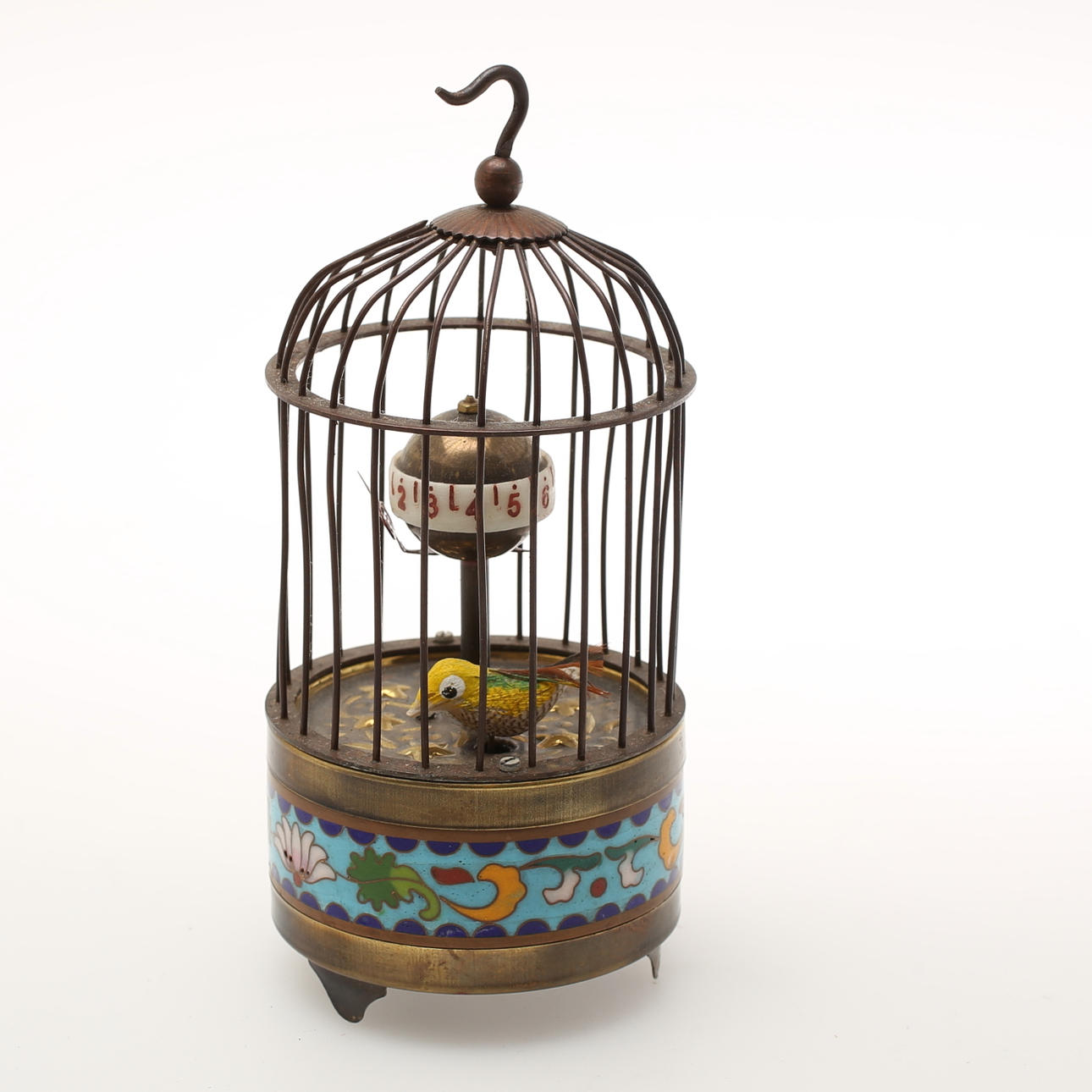 BORDSUR, i form av fågelbur med fågel, metall, emaljdekor.