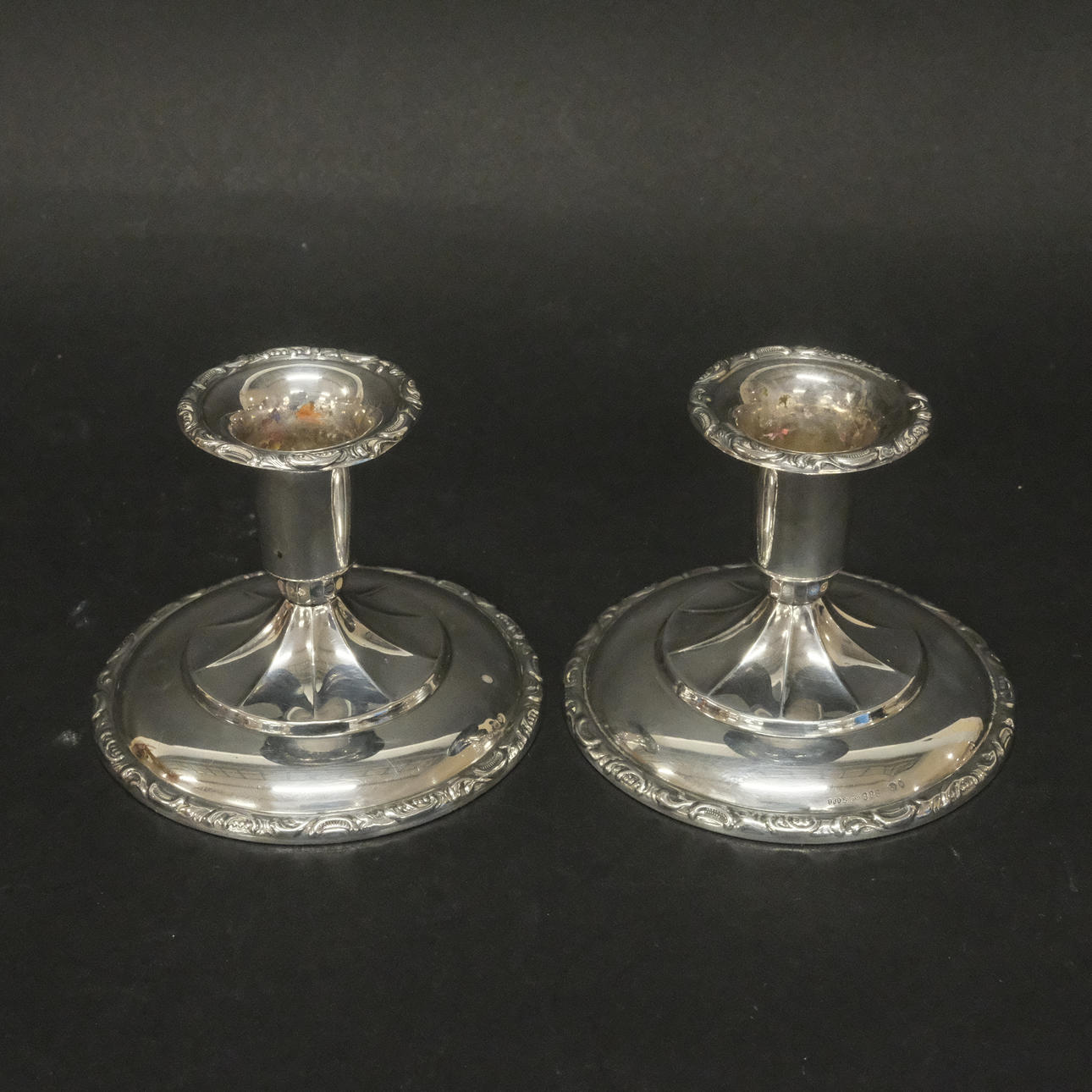 A PAIR OF CANDLESTICKS, SILVER.