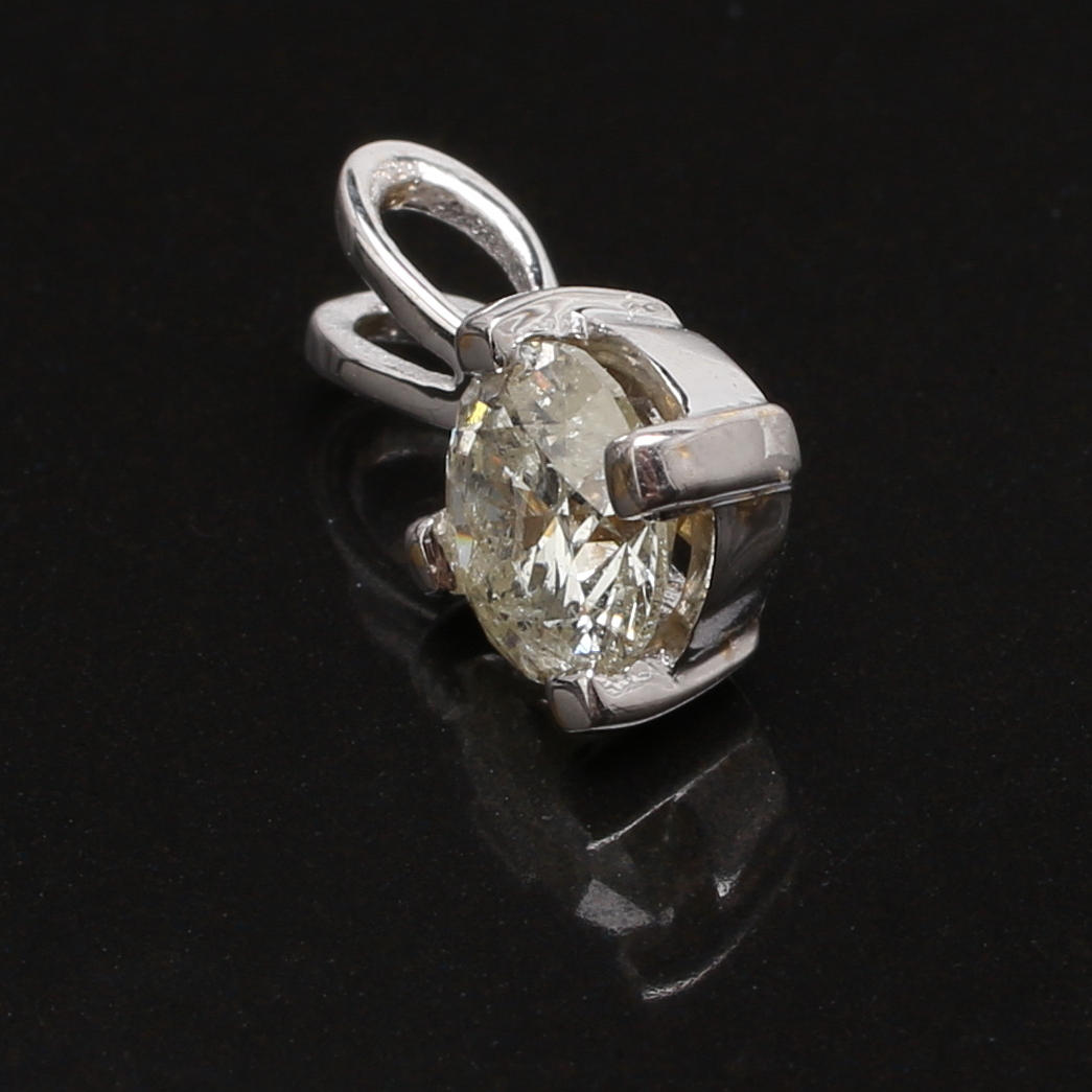 HÄNGE i 14 K vitguld med diamant 0,73 ct.