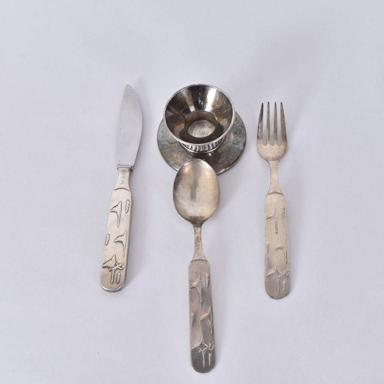 BESTICK SAMT LJUSSTAKE, silver, 1900-tal.