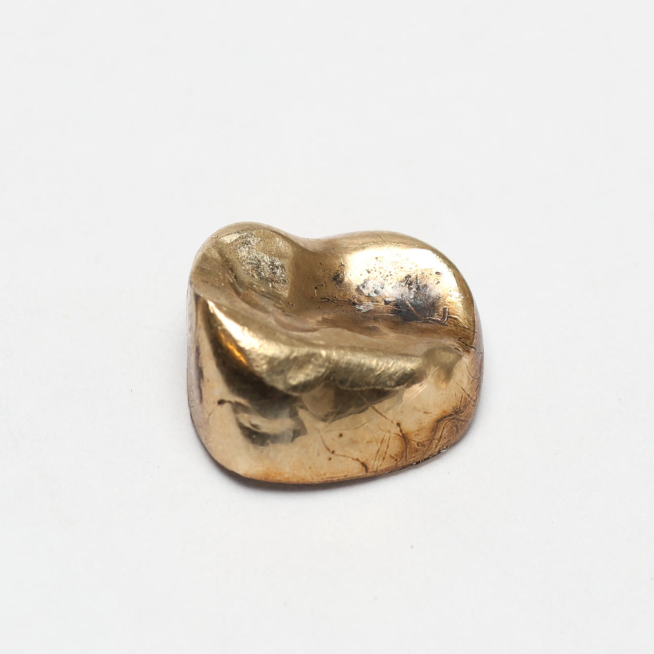 TANDGULD 18K, totalvikt 2,7 gram.