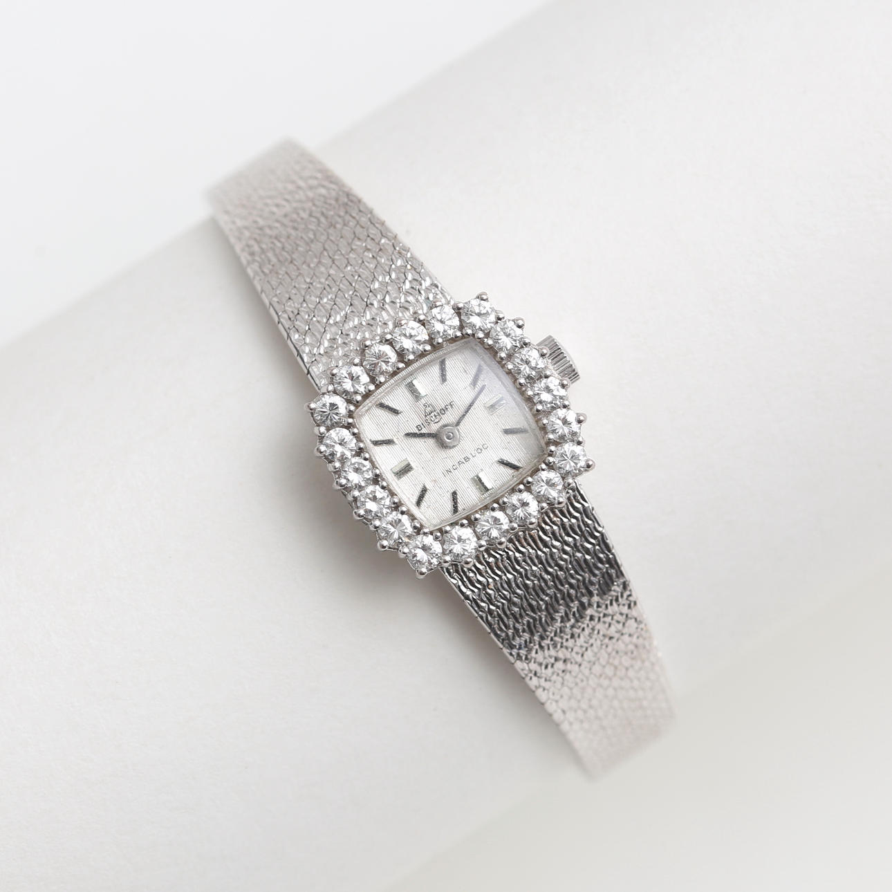 BISCHOFF Armbandsur, 18K vitguld med stenar.