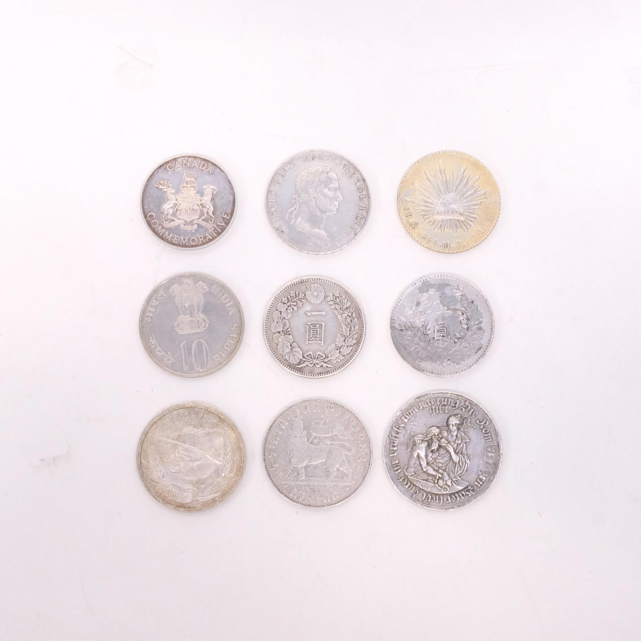 MINNESMYNT, DELVIS SILVER, NIO STYCKEN.
