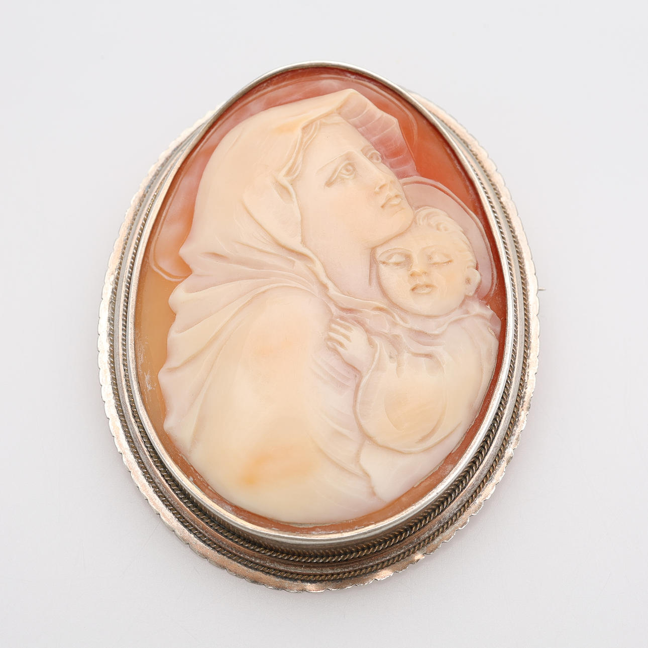 BROSCH/HÄNGE, SNÄCKCAMÉ, SILVER.