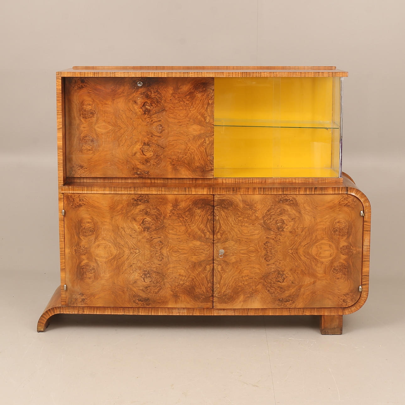 CABINET, with bar section, walnut, Art Deco, 1930s.