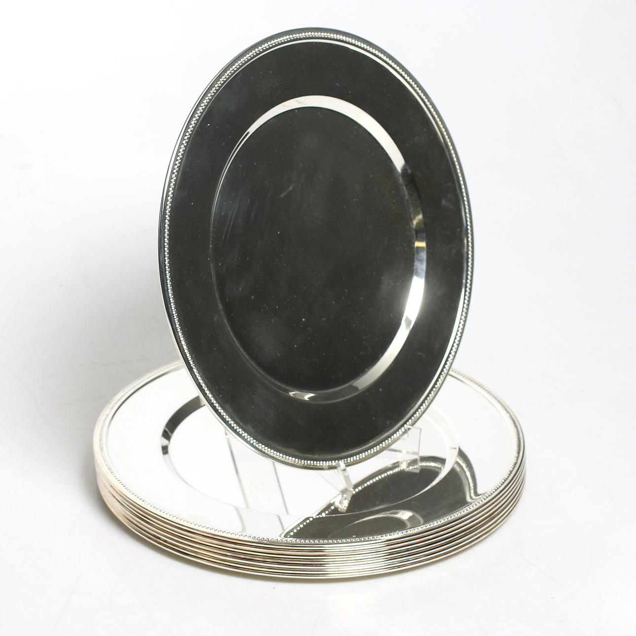 TALLRIKSUNDERLÄGG, 8 st, silverpläterade.1900-tal.