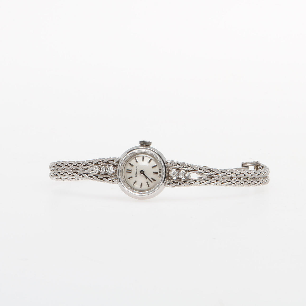 DAMARMBANDSUR, Certina, 18k vitguld med 6 små diamanter, vikt totalt ca 22 gram.