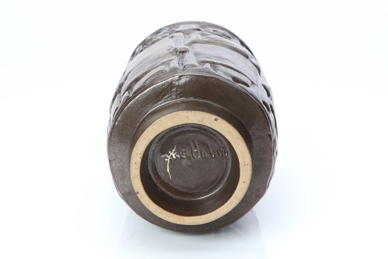 ÅKE HOLM. VASE. Glazed stoneware. Decorated with figures in relief