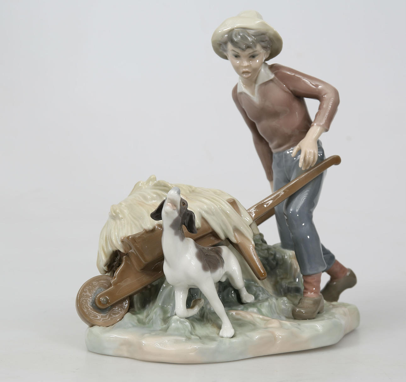 FIGURIN, porslin, Man med kärra och hund, Lladro.