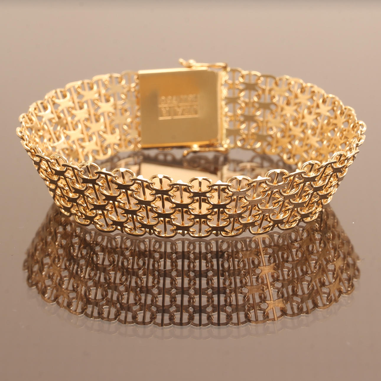 ARMBAND, 18 k guld, x-länk.