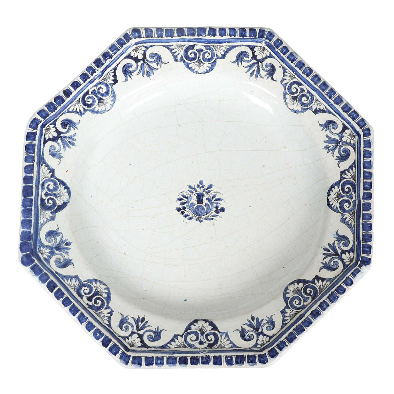 AN 18TH CENTURY MOUSTIER OCTAGONAL DISH.
