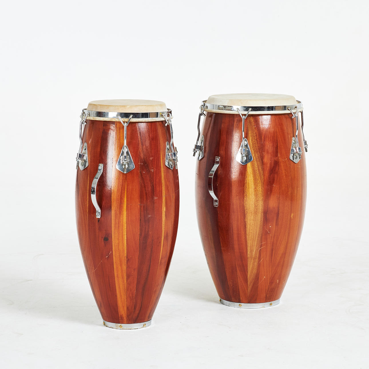 TUMBADORA/CONGAS. 2 pcs, unmarked, without stands.