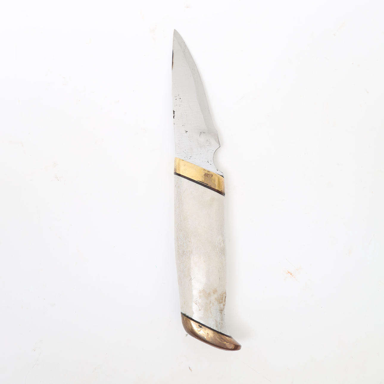 KNIV, horn och mässing.