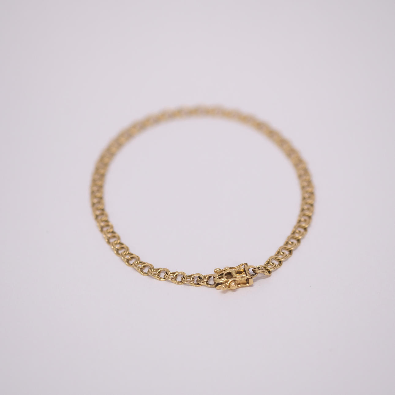 ARMBAND, "BISMARCK", 18K GULD.