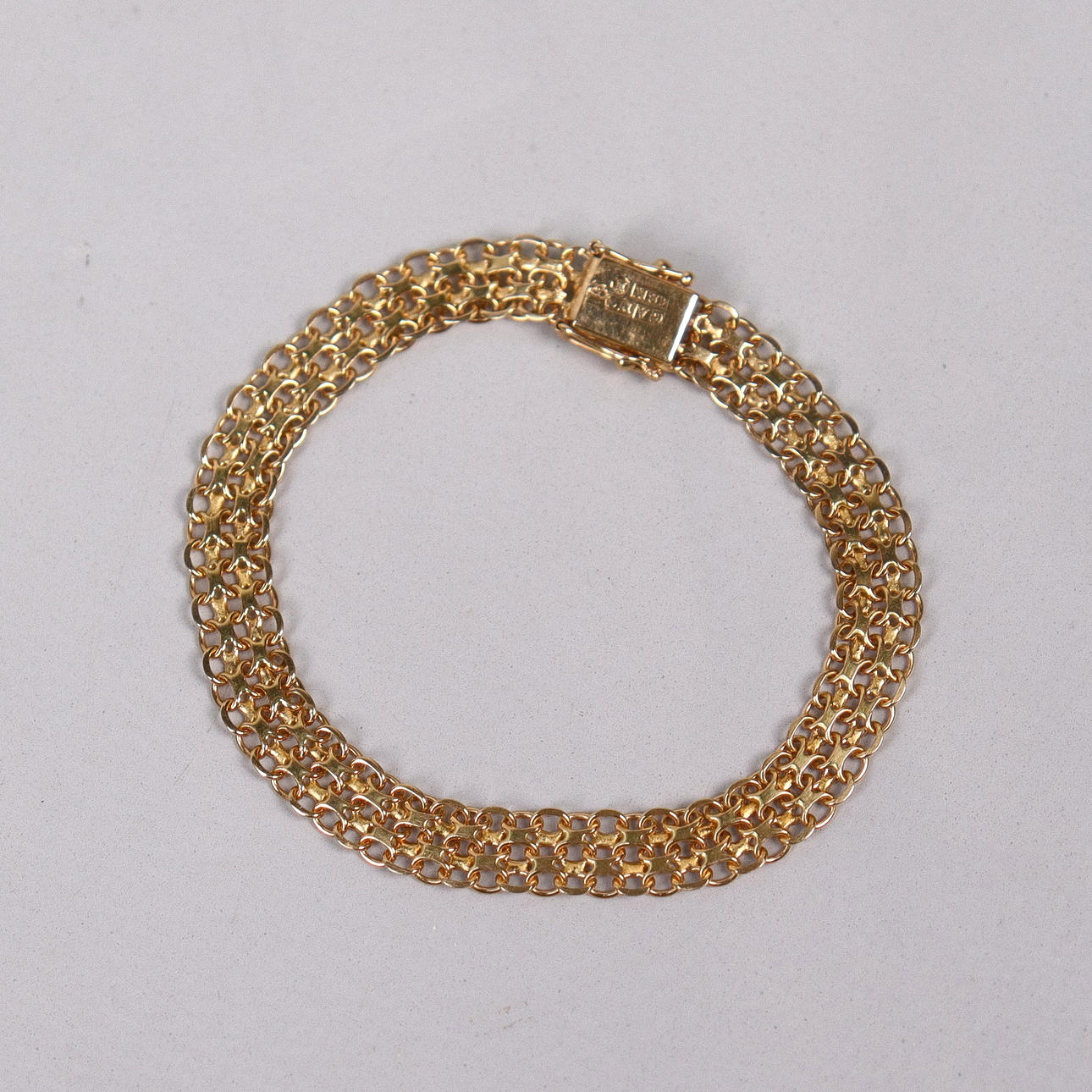 ARMBAND, X-länk, 18k guld.