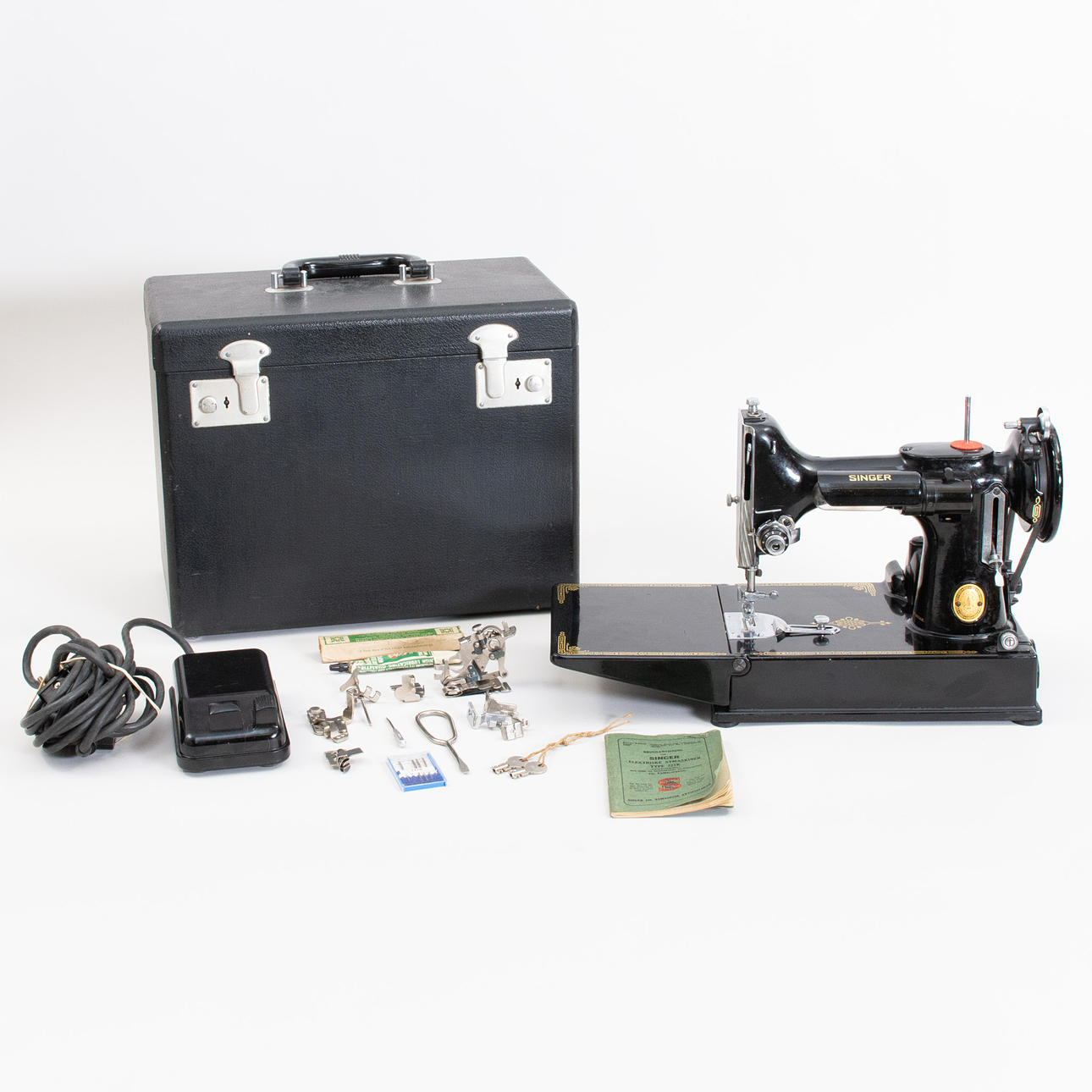 Singer sewing machine, model 221K, 20th century. Miscellaneous ...