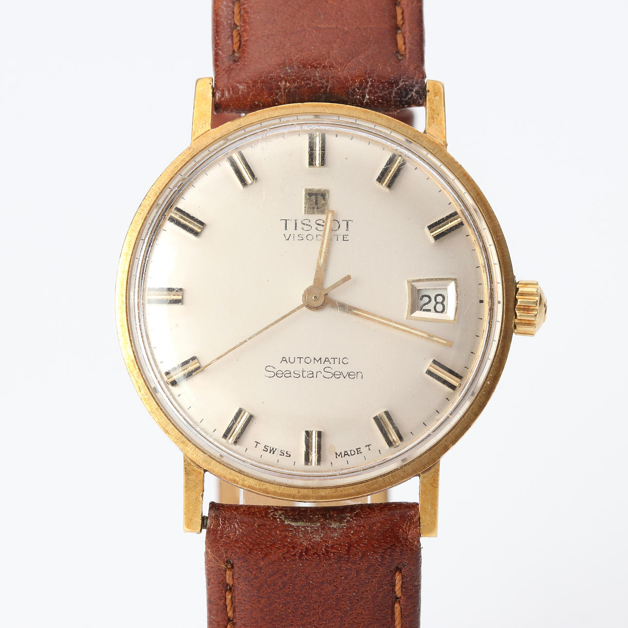 TISSOT SEASTAR SEVEN VISODATE. 18k gold case, automatic.