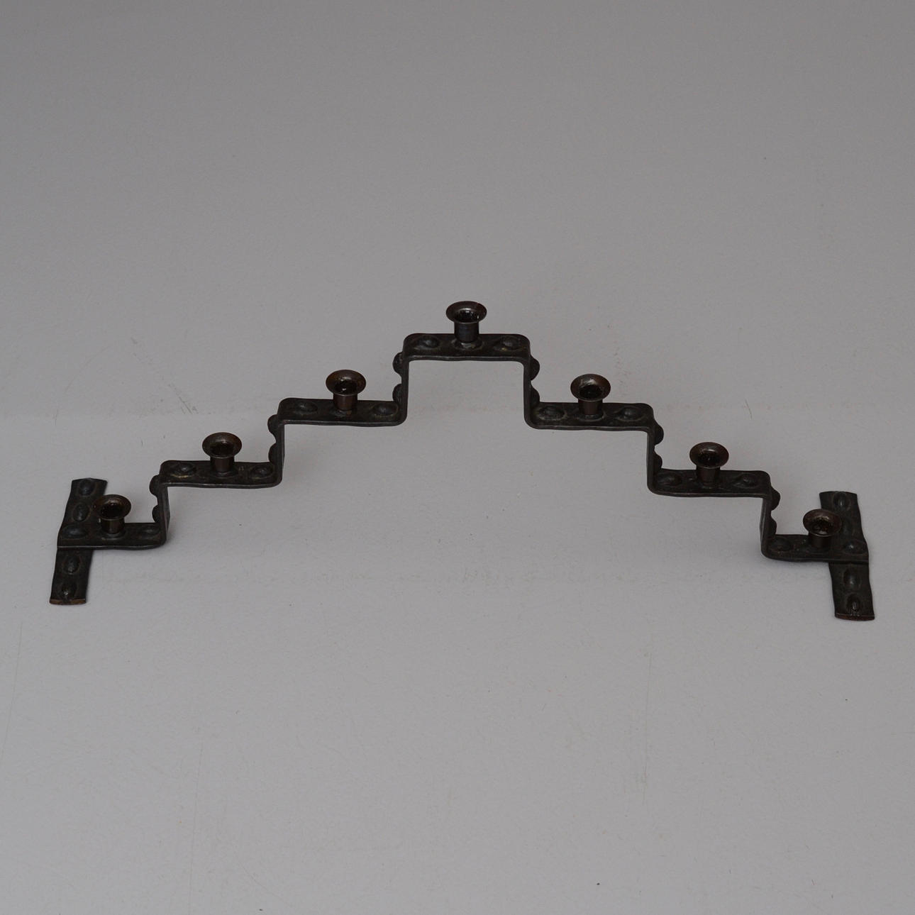 LJUSSTAKE, järnsmide.