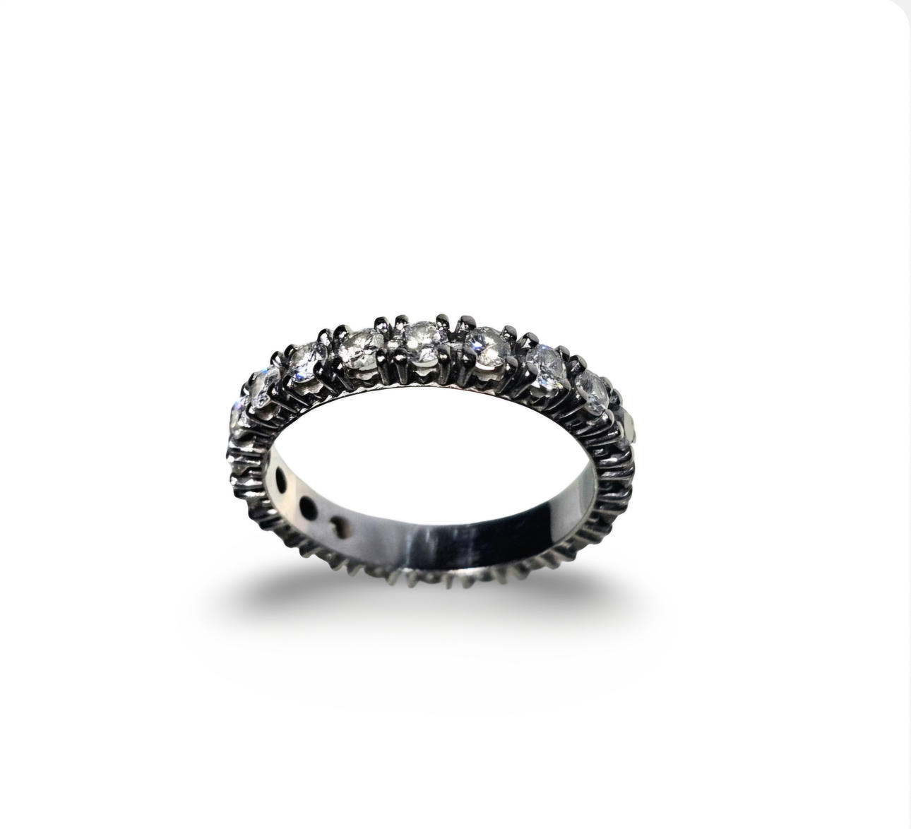 White gold and brilliant-cut diamond ring.