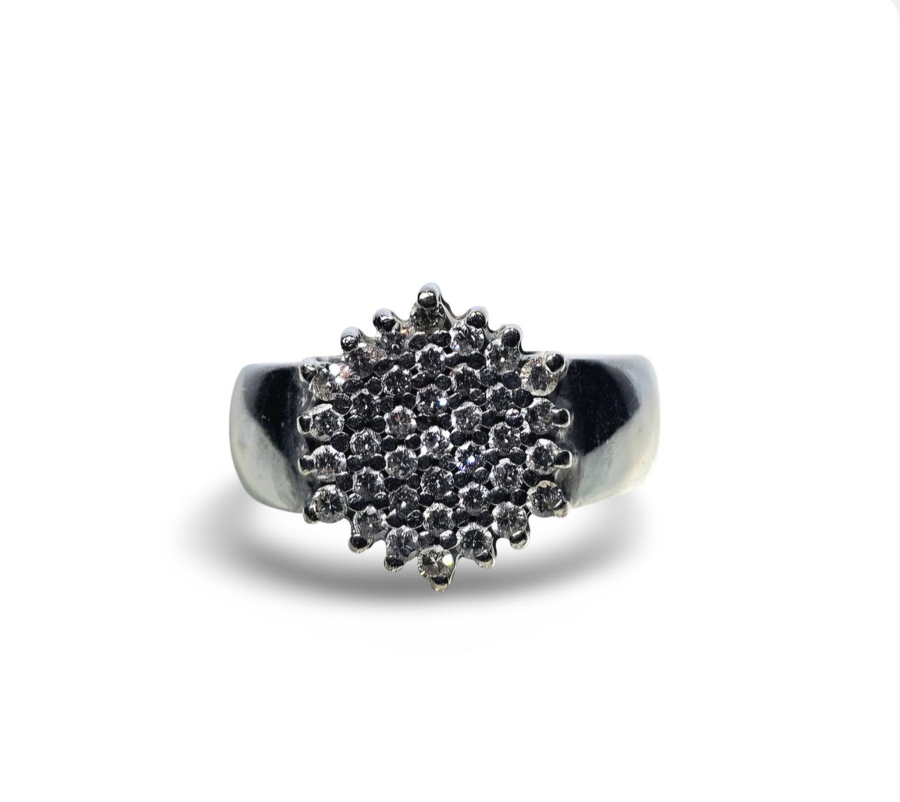 Diamond cluster ring in 18k white gold.