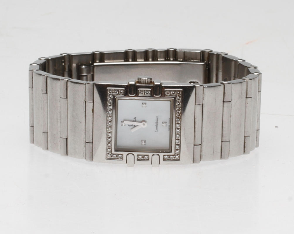 DAMARMBANDSUR, "Quadra" Omega Constellation, briljantslipade diamanter totalt 0,23 ct.