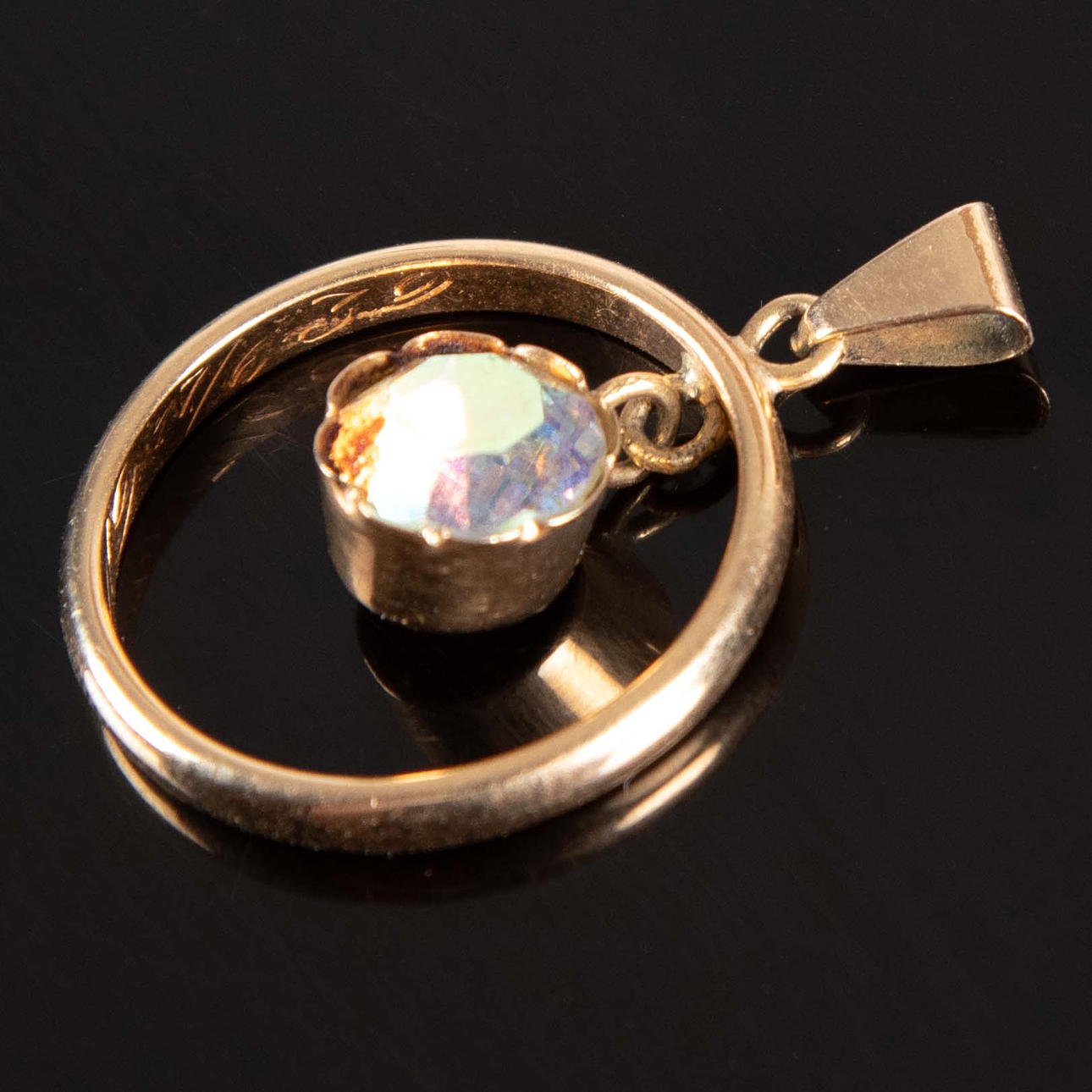 RING CONVERTED TO PENDANT 18 K GOLD.