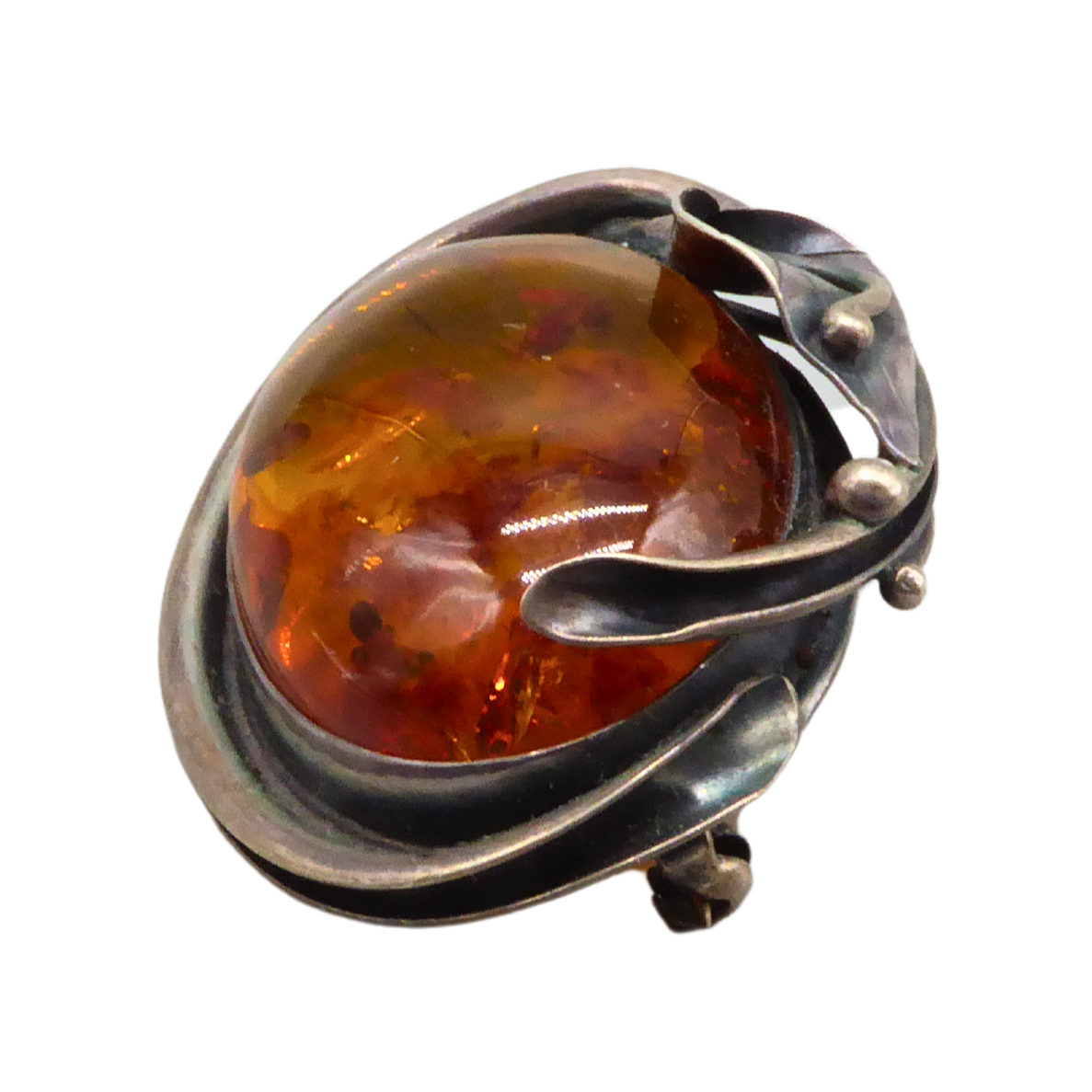 SILVER BROOCH WITH AMBER.