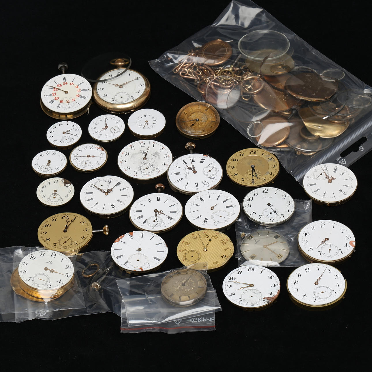 URVERK, 26 st för fickur, mestadels omärkta 1900-tal.