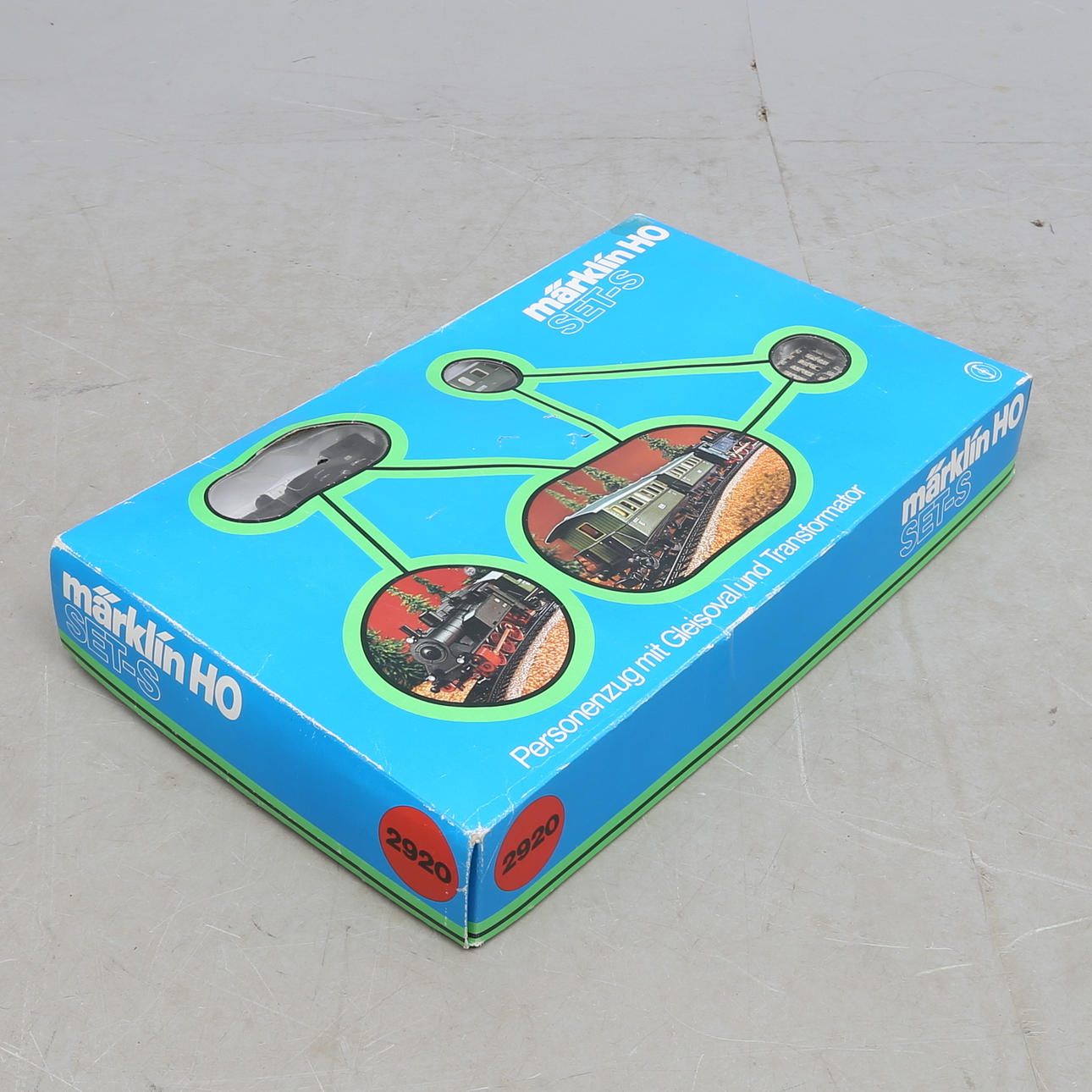 MÄRKLIN tågsats 2920 med ånglok, 2 vagnar, räls och trafo. Originalkartong.