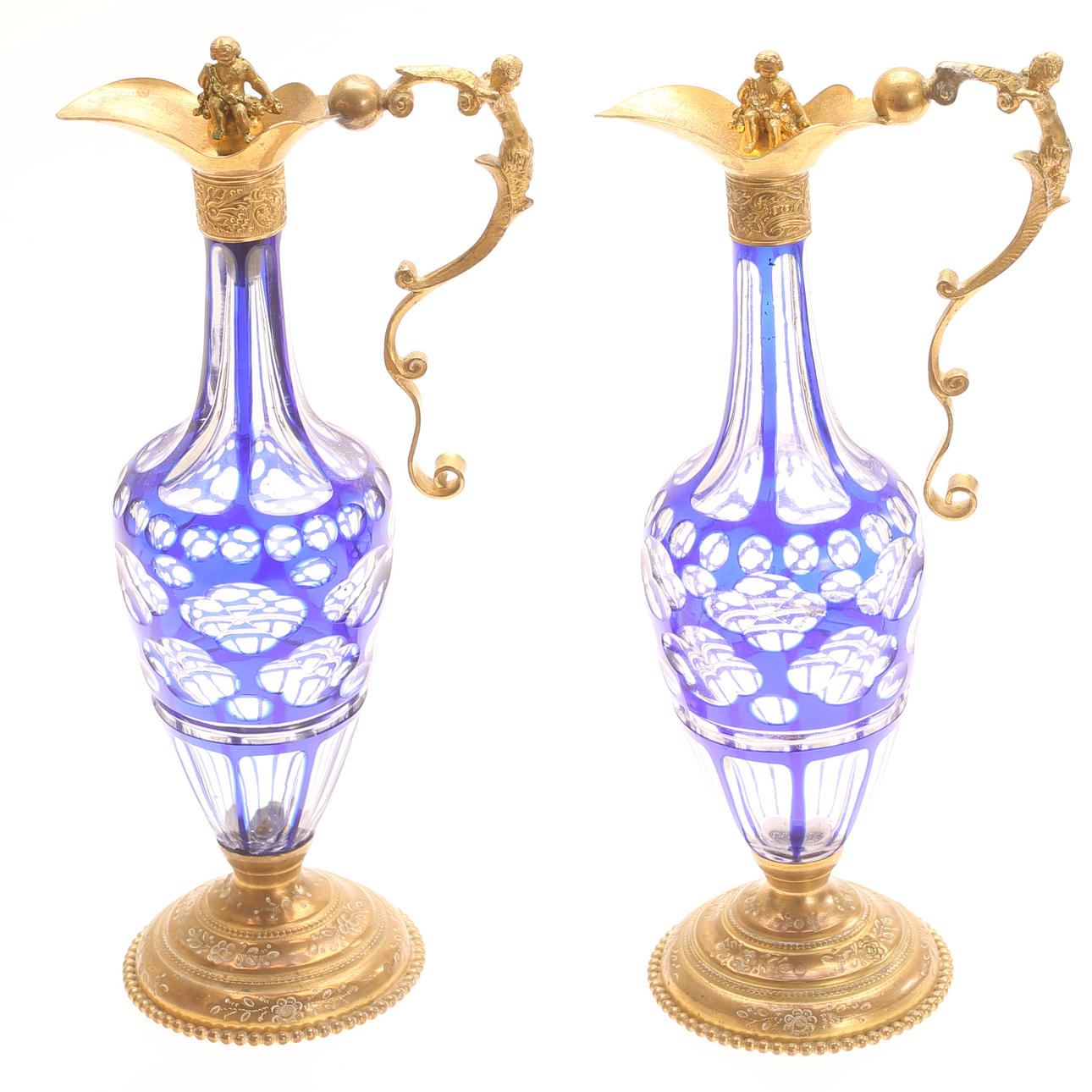 KARAFFER, 2 stycken, glas och mässing, 1800-tal.