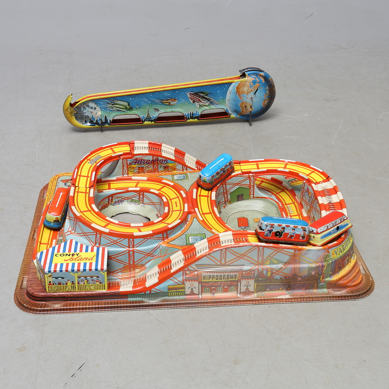 Berg och dalbana "CONEY ISLAND", Rymdbana i plåt, urverk, U.S.Zone samt 4 bussar för banor, urverk, Western Germany.