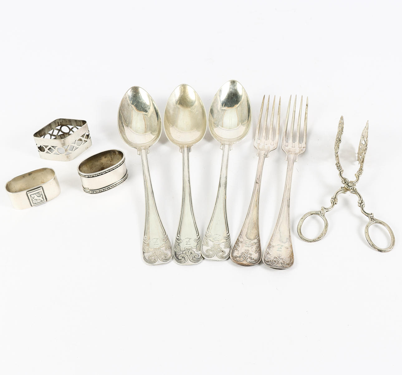 SILVER, bestick och servettringar, 9 delar.
