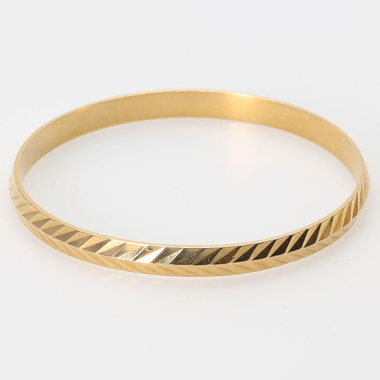 ARMRING, 14 k guld, mönstrad, massiv.
