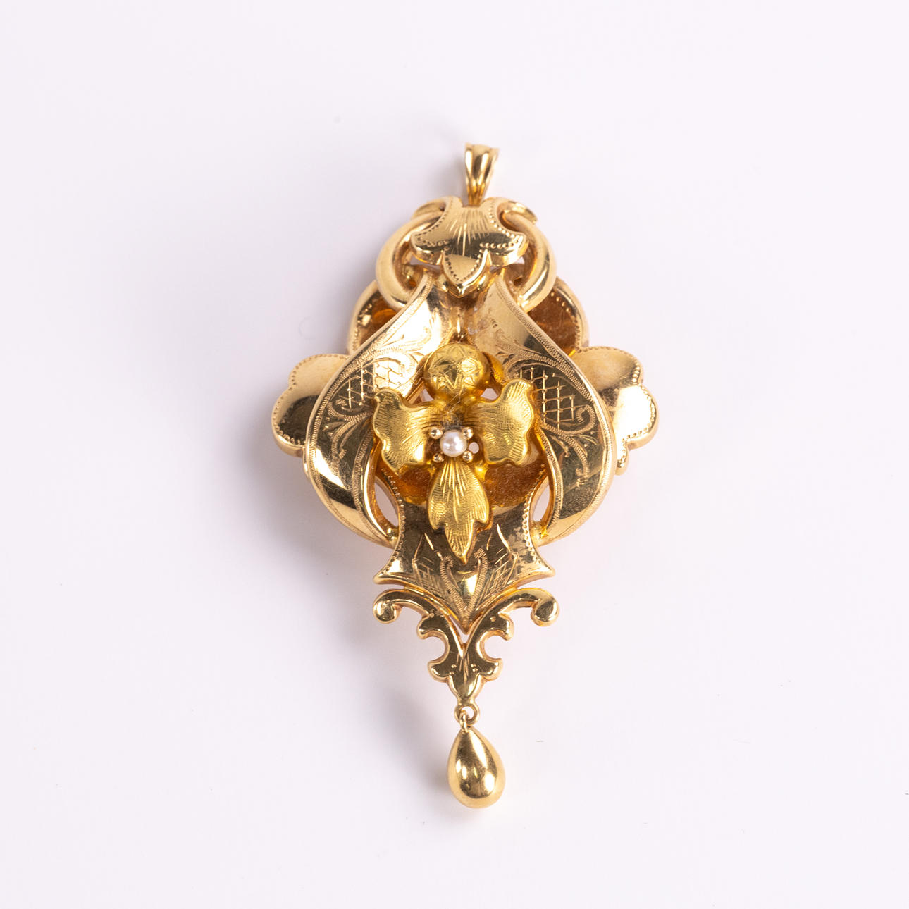 BROSCH. 18k guld.