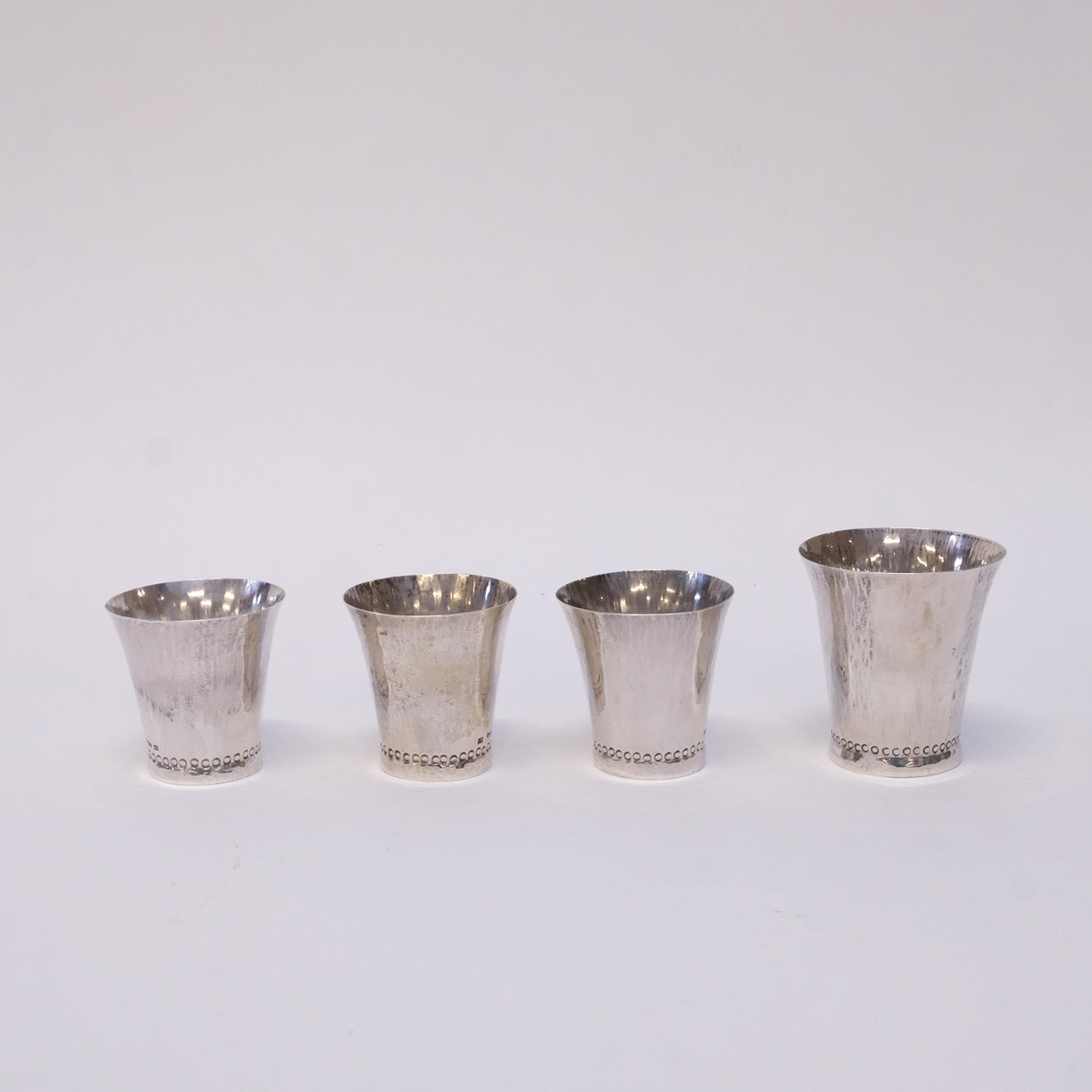 FYRA MYNTBÄGARE, SILVER.