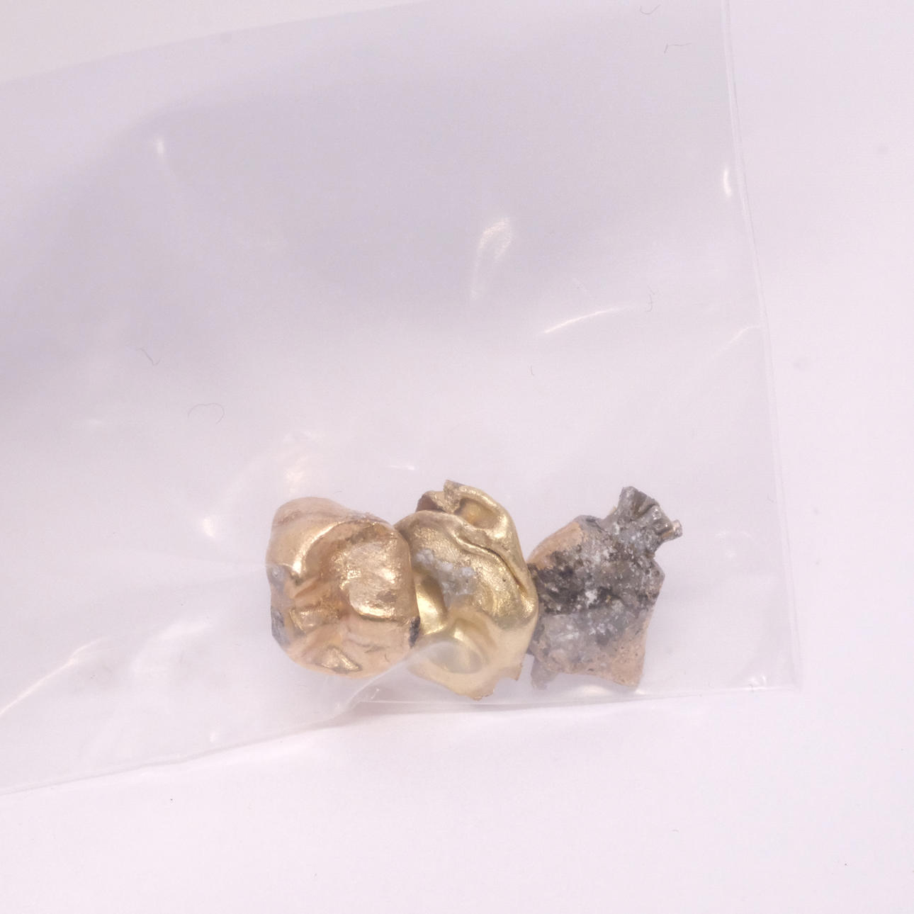 TANDGULD, RENSAT, 18K GULD.