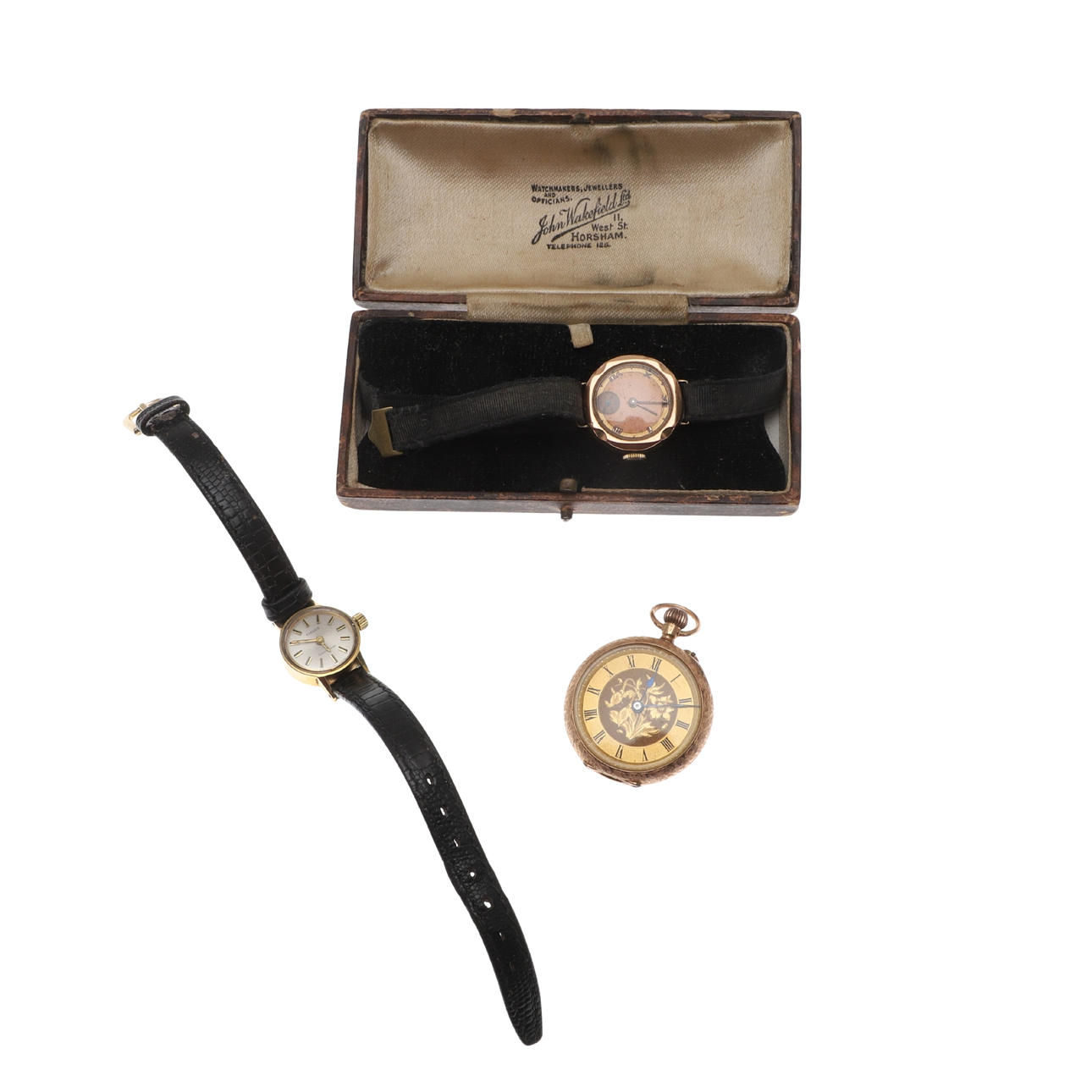 THREE ASSORTED WATCHES.