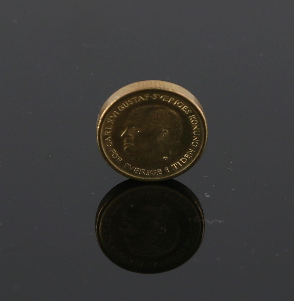 MYNT, 10 kr 1991 felvänd stamp.