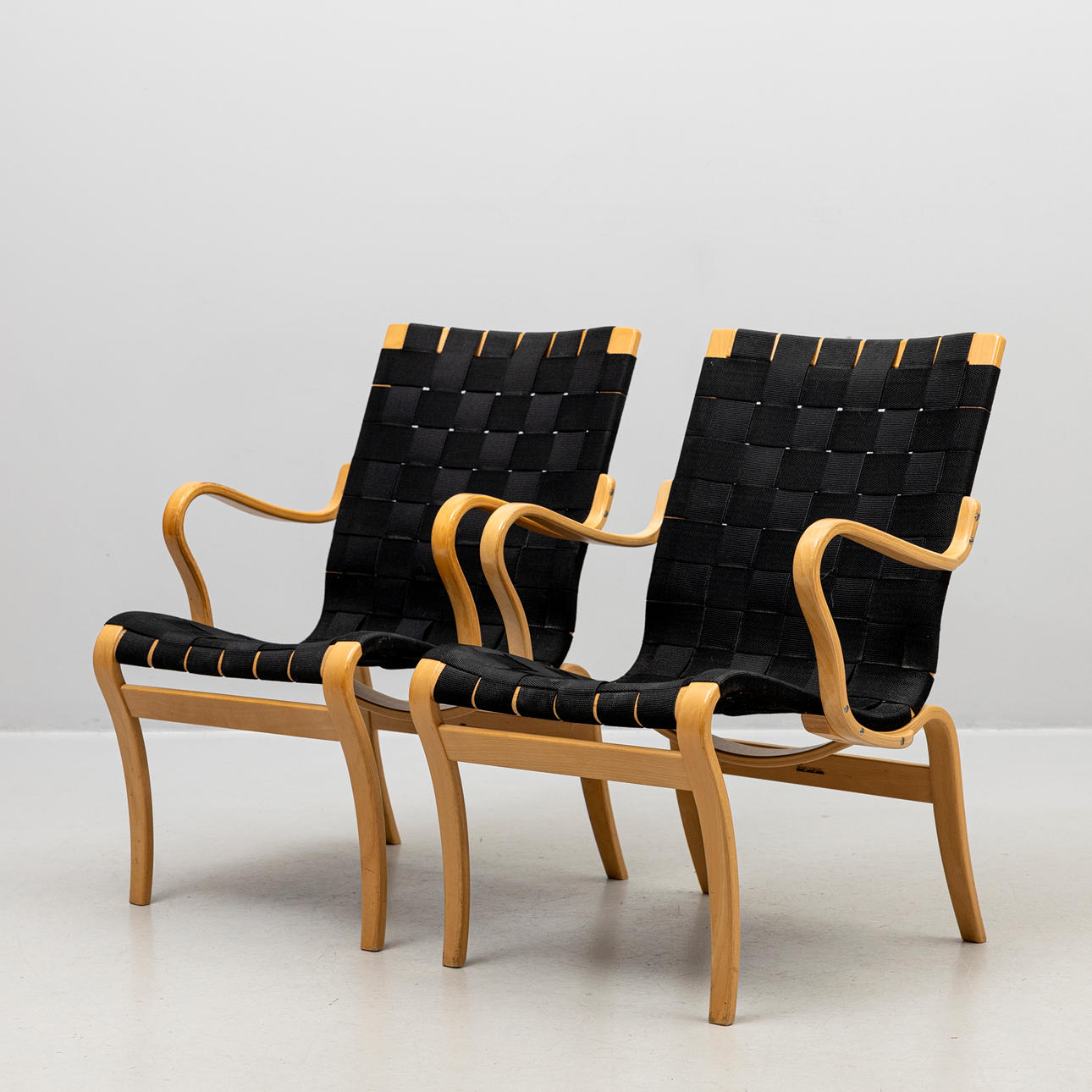 BRUNO MATHSSON. Easy chairs, a pair, 