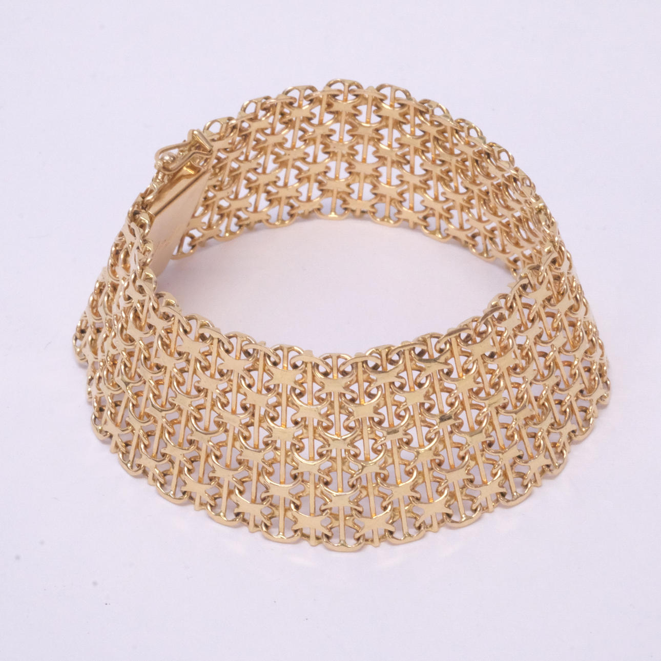 ARMBAND. X-LÄNK, 18K GULD.